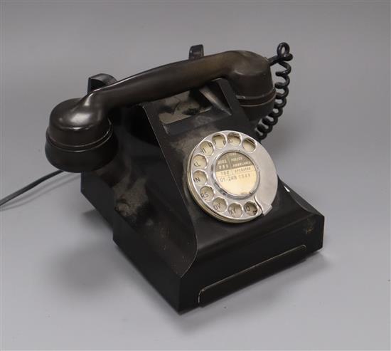 A black bakelite telephone